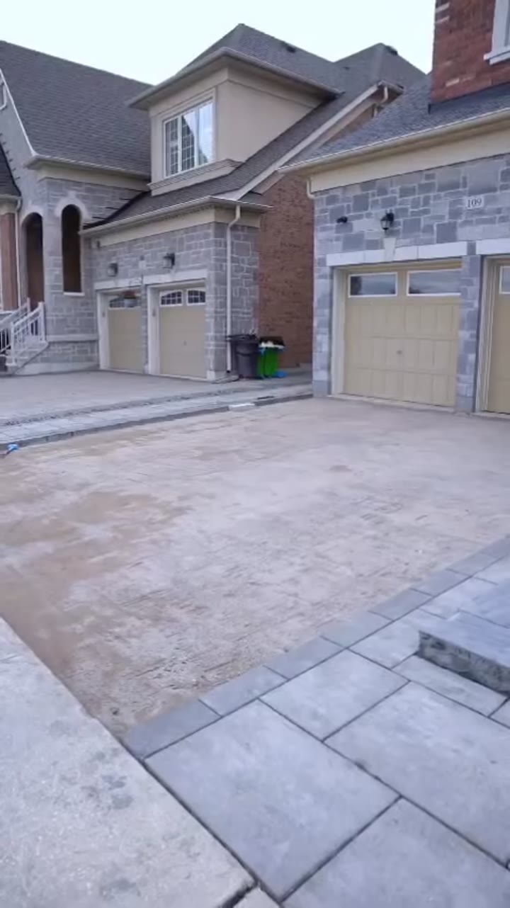 New interlocking driveway at a stone house